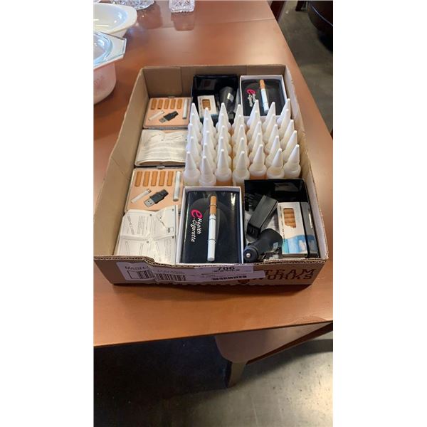 Tray of assorted ejuice, and e cigarettes