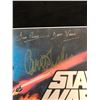 Image 3 : Star Wars poster signed by Harrison Ford, Dave Prowse, Carrie Fisher & Mark Hamill (R.A. COA)