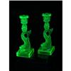 Image 1 : A PAIR OF VASELINE GLASS DOLPHIN MMA CANDLESTICKS