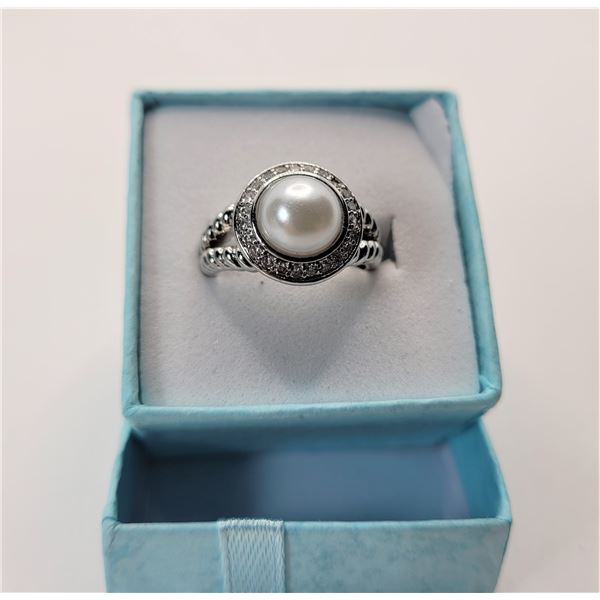 21)  STAMPED 925 SILVER RING SET WITH A