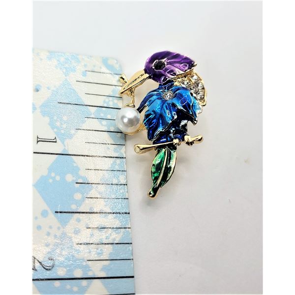 26)  GOLD TONE WITH PURPLE, BLUE AND GREEN