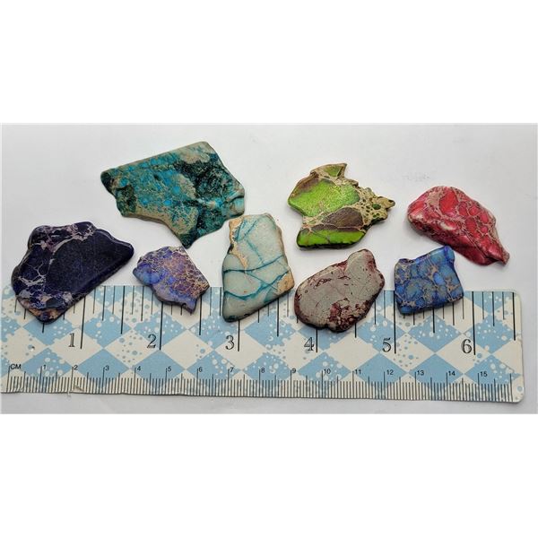 3)  LOT OF 8 MULTI COLORED JASPER SLICED