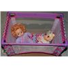 Image 1 : DOLL CRIB WITH 2 BABIES