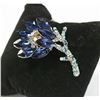 Image 1 : FLOWER RHINESTONE BROOCH WITH MARQUIS CUT STONES