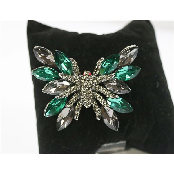 BUTTERFLY BROOCH WITH MARQUIS CUT STONES
