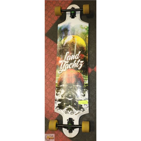 LAND YACHT THE 9 TWO 5 LONG BOARD.