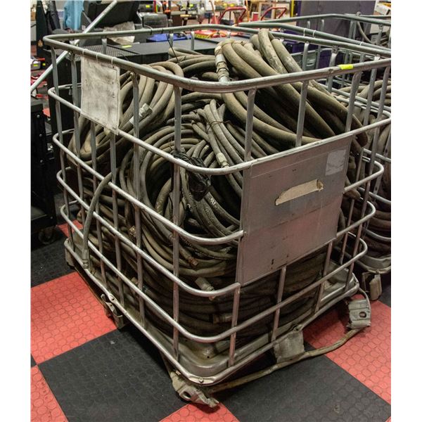 CAGE LOT FULL OF INDUSTRIAL HOSES