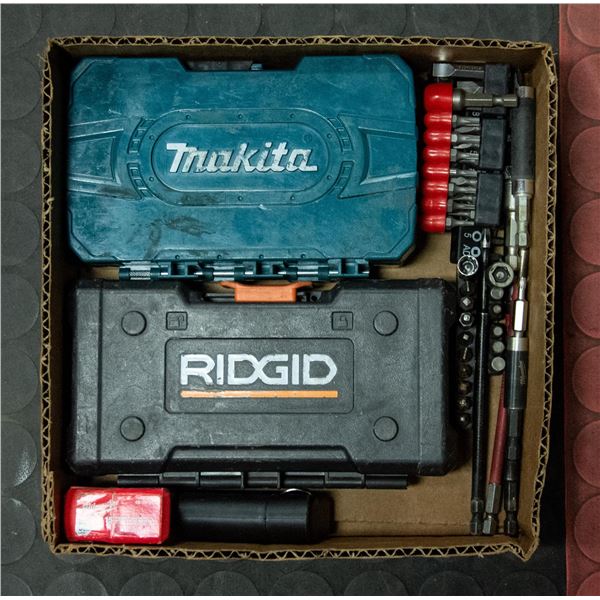 BOX W/ VARIOUS SCREWDRIVER BIT SETS. MAKITA,