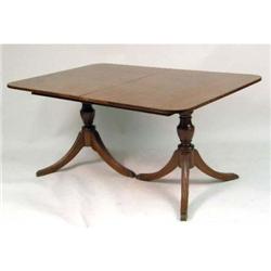 AN OAK DINING TABLE