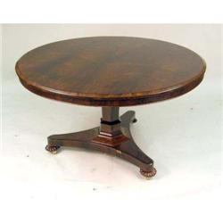 A VICTORIAN ROSEWOOD TILT TOP CENTER TABLE