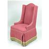 Image 1 : AN UPHOLSTERED WING CHAIR