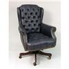 Image 1 : A BLUE LEATHERETTE SWIVELING CLUB CHAIR