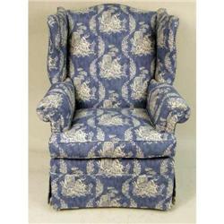 A GEORGE III-STYLE BLUE AND WHITE UPHOLSTERED WING CHAIR