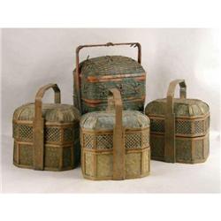 A GROUP OF FOUR CHINESE WOVEN LUNCH BASKETS