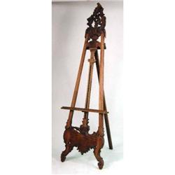 A ROCOCO-STYLE WALNUT ADJUSTABLE EASEL
