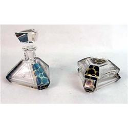 A COLORLESS ETCHED GLASS PERFUME BOTTLE WITH STOPPER