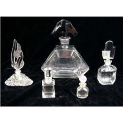 A GROUP OF COLORLESS GLASS TABLE ARTICLES