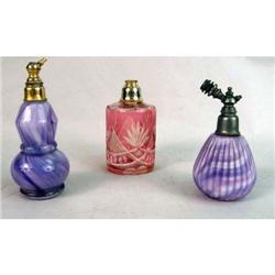 A GROUP OF THREE GLASS ATOMIZERS