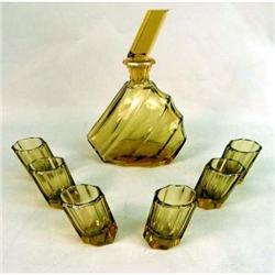 AN AMBER COLORED GLASS CORDIAL SERVICE