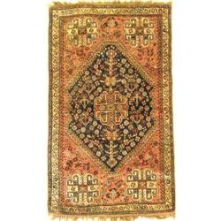 A HANDWOVEN ORIENTAL RUG