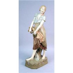 A POLYCHROME-DECORATED FIGURE OF A FEMALE