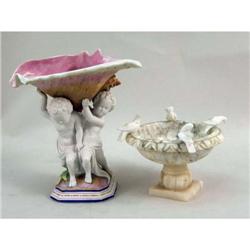 A POLYCHROME-DECORATED PORCELAIN FIGURE