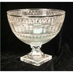 A COLORLESS GLASS FOOTED COMPOTE