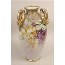 A HANDPAINTED POLYCHROME AND PARCEL-GILT DECORATED PORCELAIN VASE