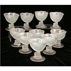 A GROUP OF FROSTED TO CLEAR GLASS DOLPHIN-BASE DESSERT COMPOTES