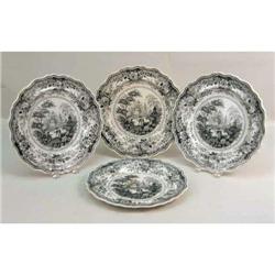 A GROUP OF FOUR BLACK AND WHITE TRANSFER DECORATED PLATES