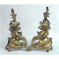 A PAIR OF LOUIS XV STYLE CAST BRONZE CHENETS