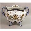 Image 1 : A POLYCHROME-DECORATED SHAPED DOUBLE HANDLED FOOTED PORCELAIN PLANTER