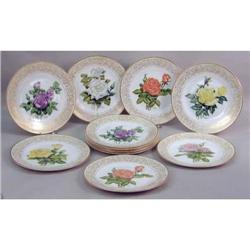 TWELVE BOEHM POLYCHROME-DECORATED PARCEL-GILT PORCELAIN SERVICE PLATES