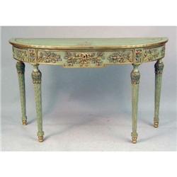 A GREEN-PAINTED AND GILDED DEMI-LUNE TABLE