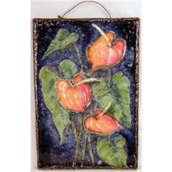 A GERMAN MAJOLICA WALL PLAQUE OF FLOWERS