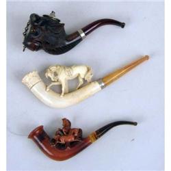 A GROUP OF THREE PIPES