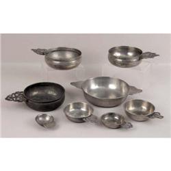 A GROUP OF SEVEN PEWTER PORRINGERS
