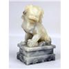 Image 1 : A CARVED HARDSTONE CHINESE LION