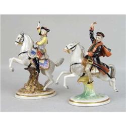 A PAIR OF CONTINENTAL PORCELAIN SOLDIERS ON HORSEBACK