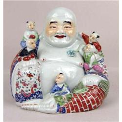 A CHINESE PORCELAIN HOTAI SURROUNDED BY CHILDREN