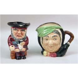 A POLYCHROME-DECORATED PORCELAIN TOBY MUG