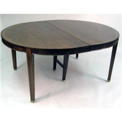 AN OVAL DINING TABLE