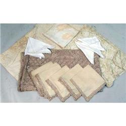 AN ASSORTED GROUP OF TABLE LINENS