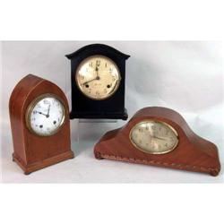 A GROUP OF THREE WOOD SHELF CLOCKS