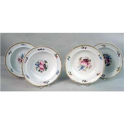 FOUR STAFFORDSHIRE POLYCHROME AND PARCEL-GILT DECORATED PORCELAIN RIM SOUP BOWLS