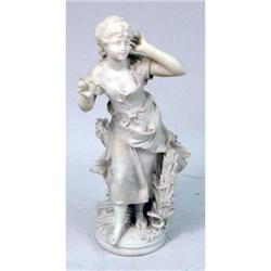 A CARVED MARBLE FIGURE OF A YOUNG MAIDEN