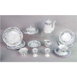 AN ASSEMBLED POLYCHROME-DECORATED PORCELAIN TABLE SERVICE