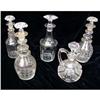 Image 1 : A GROUP OF COLORLESS GLASS CRUETS WITH STOPPERS