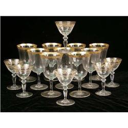 A GROUP OF COLORLESS GLASS AND PARCEL-GILT DECORATED STEMWARE