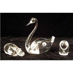 A GROUP OF THREE COLORLESS GLASS FIGURES
